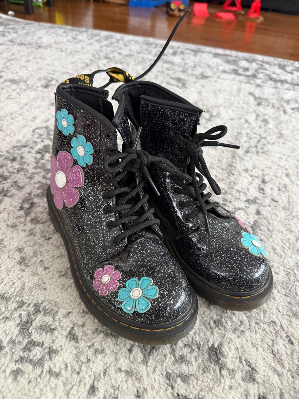 Doc Martens Black Glitter Floral Lace-Up Kids Boots with Pink & Teal Flowers